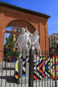 Plaza in Malasana with statue clutching a beer bottle